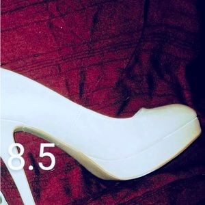 High heels. Size 8.5 Color off white.